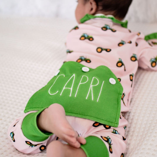 One-Piece Ruffle Buttflap Pajamas - Tractors On Pink